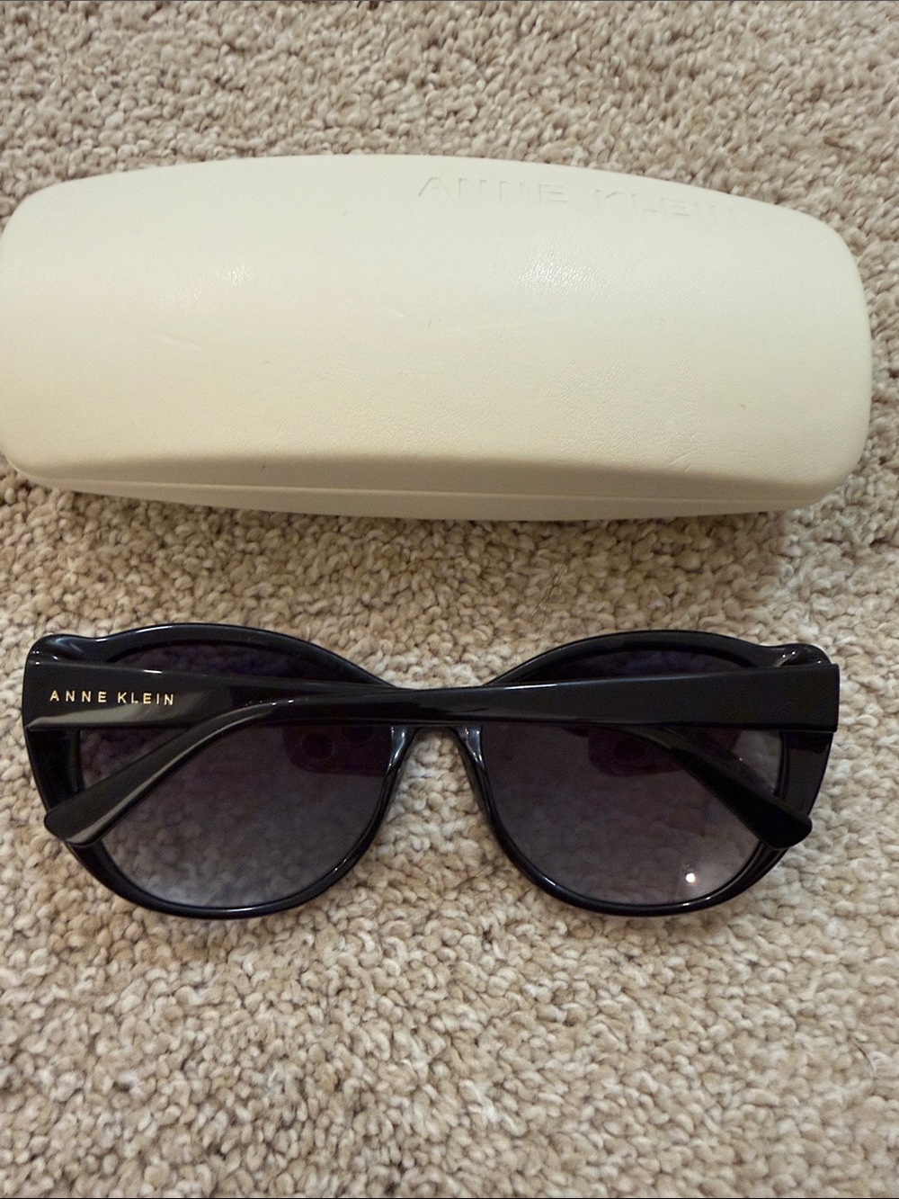 Anne Klein Black Round Sunglasses with Gold Logo